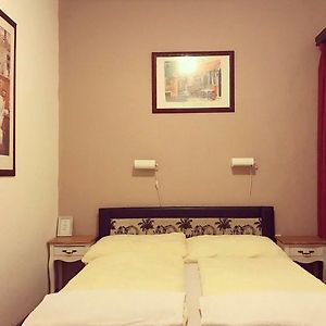Kamer met een Queen Size Bed
